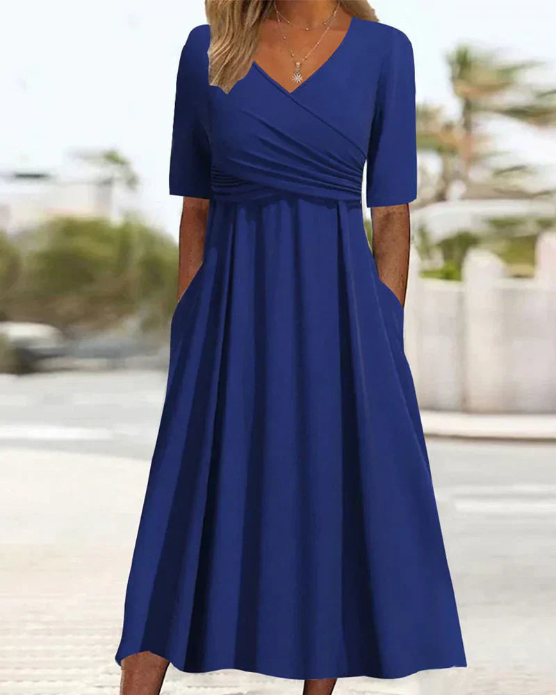 Elegant women's maxi dress with chic V-neck, A-line silhouette, and side pockets, perfect for casual and formal events.