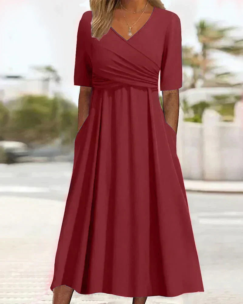 Elegant women's maxi dress with chic V-neck, A-line silhouette, and side pockets, perfect for casual and formal events.