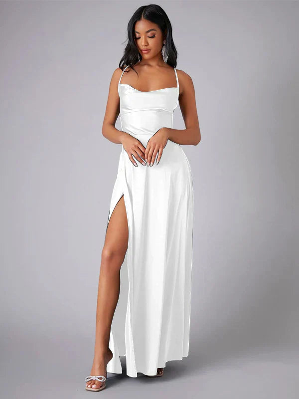 Elegant women's maxi dress with high slit and open back, featuring a figure-flattering silhouette and criss-cross design.