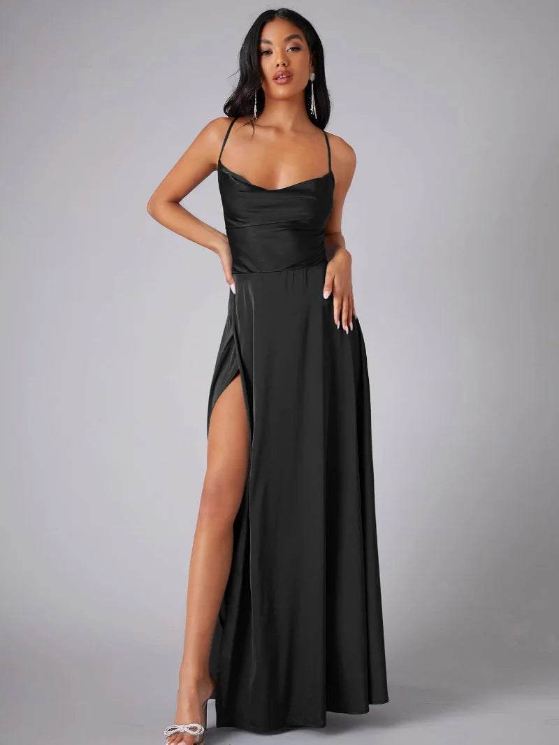 Elegant women's maxi dress with high slit and open back, featuring a figure-flattering silhouette and criss-cross design.