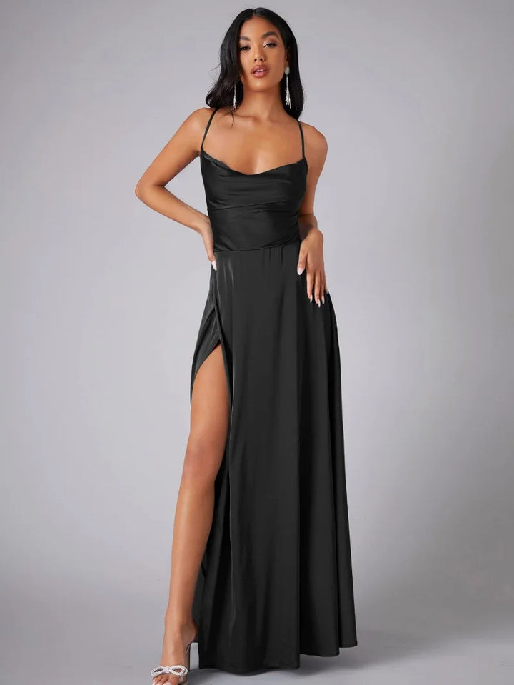 Elegant women's maxi dress with high slit and open back, featuring a figure-flattering silhouette and criss-cross design.
