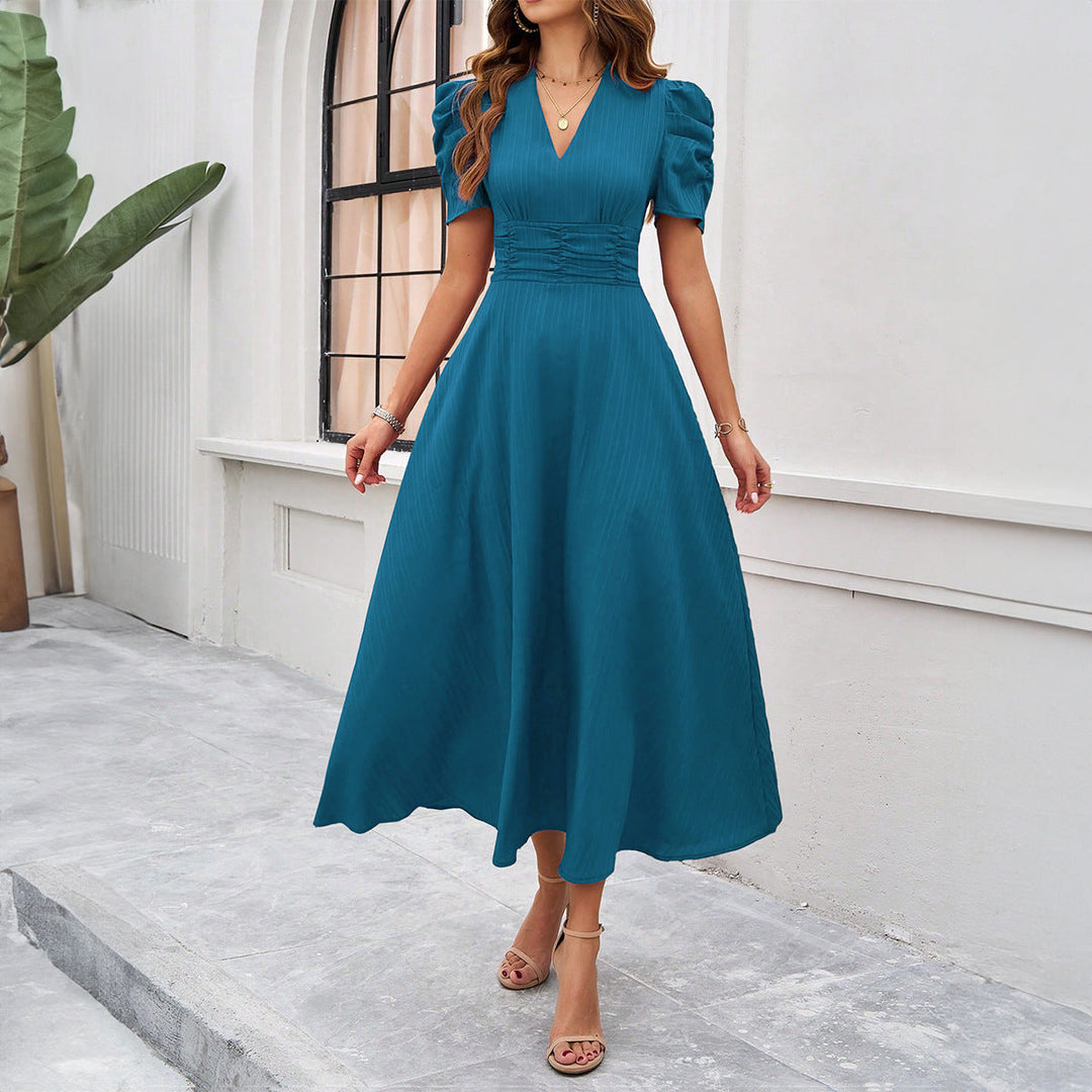 Elegant women's midi dress with a V-neck, puff sleeves, and a ruched waist, fit and flare design, perfect for any occasion.