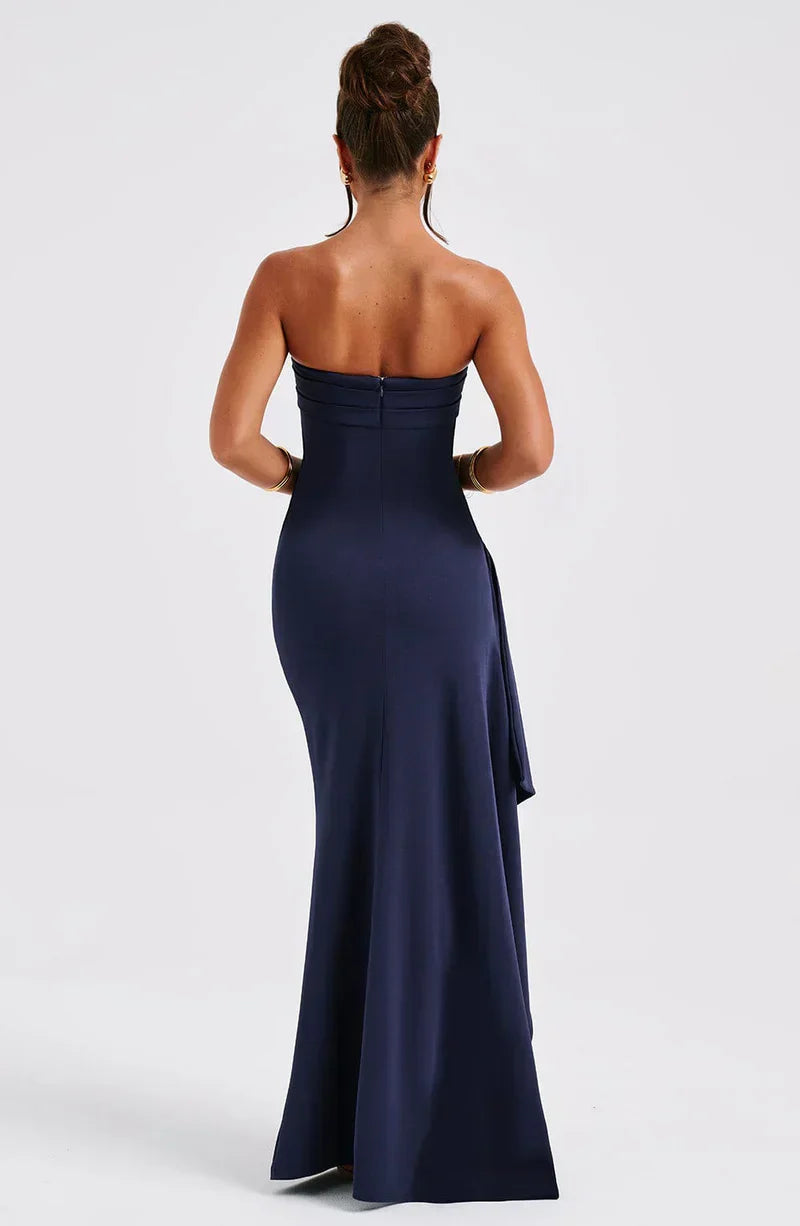 Elegant women's off-shoulder twisted maxi dress in navy, showcasing a flowing, flattering silhouette for evening events.