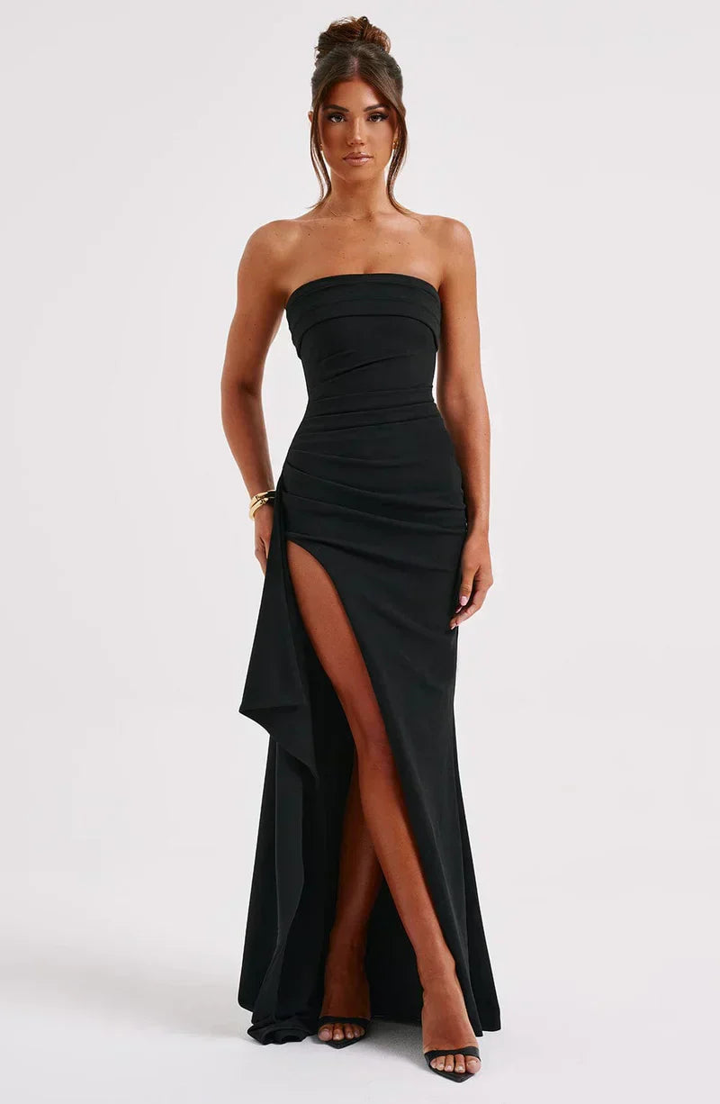 Elegant women's off-shoulder twisted maxi dress in navy, showcasing a flowing, flattering silhouette for evening events.