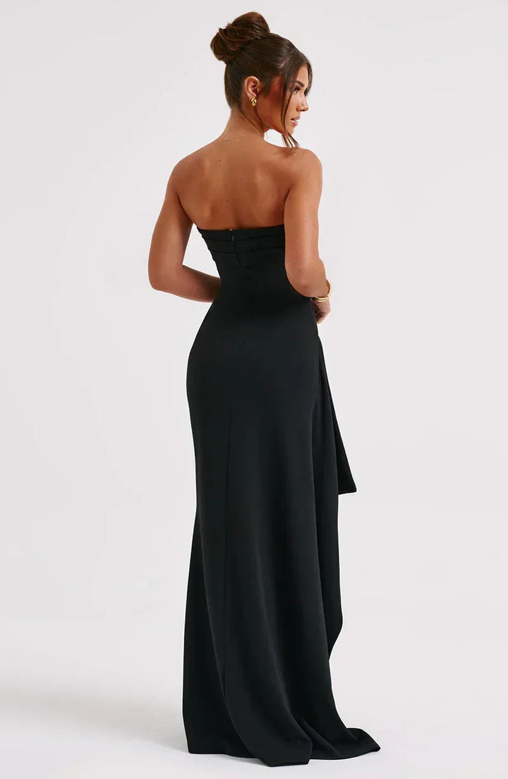 Elegant women's off-shoulder twisted maxi dress in navy, showcasing a flowing, flattering silhouette for evening events.