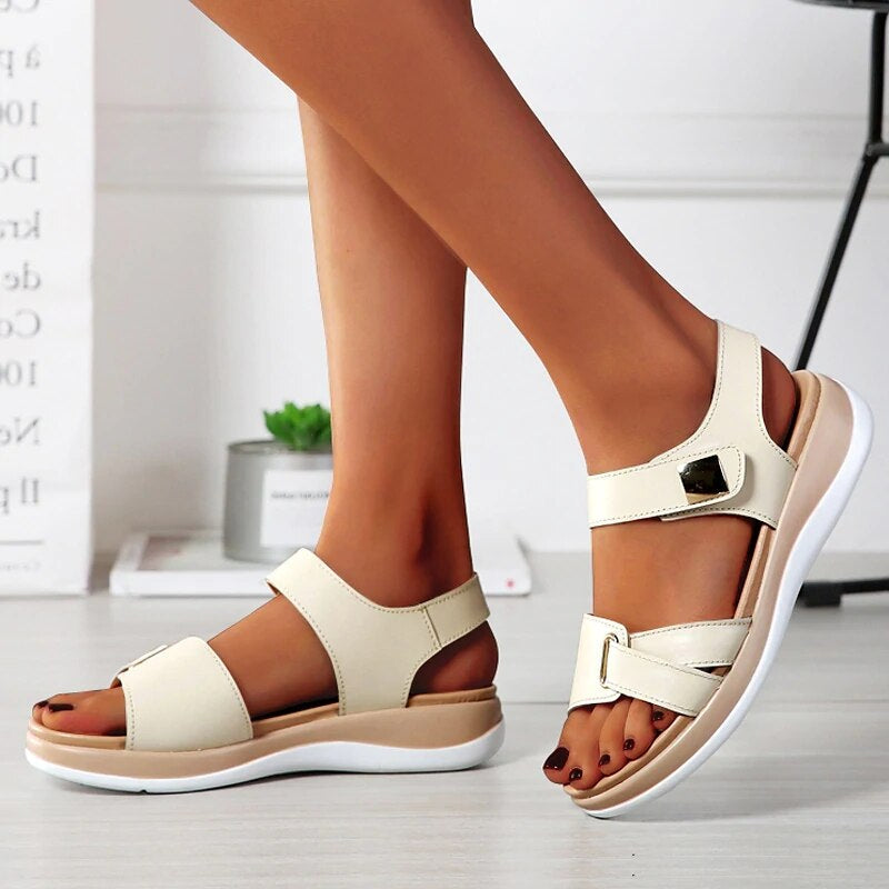 Elegant women's orthopedic sandals with sleek design and foot support, ideal for spring and summer wear.