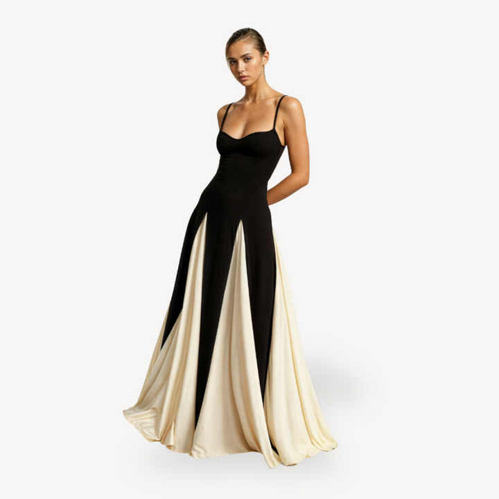 "Elegant women's satin maxi dress with spaghetti straps, black and ivory, flowing skirt, perfect for formal occasions."