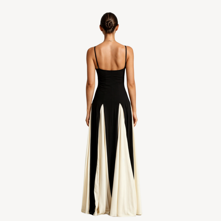 "Elegant women's satin maxi dress with spaghetti straps, black and ivory, flowing skirt, perfect for formal occasions."