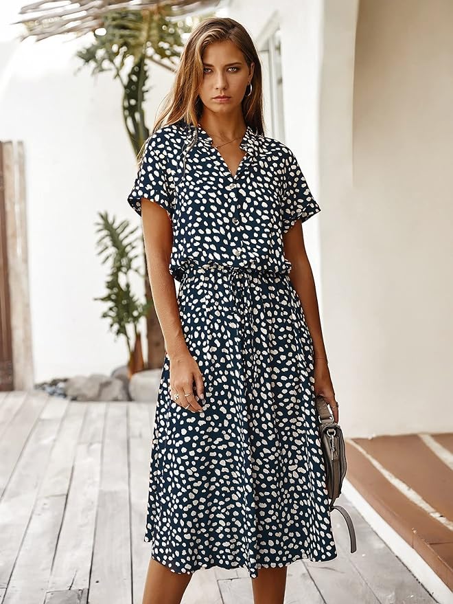 Elegant women's short-sleeve midi dress, flattering silhouette, versatile for any occasion, chic and timeless style.