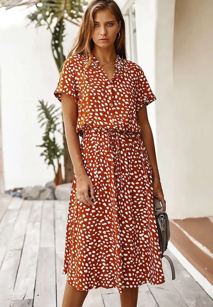 Elegant women's short-sleeve midi dress, flattering silhouette, versatile for any occasion, chic and timeless style.