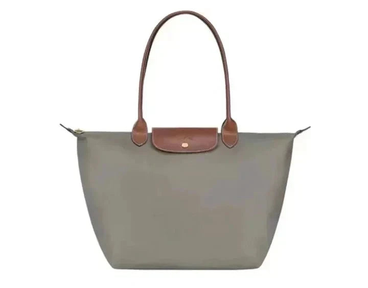 Elegant women's shoulder bag with adjustable straps, spacious interior, chic design for style and functionality.