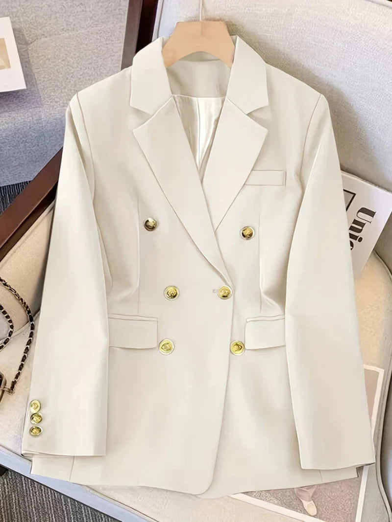 Elegant women's slim blazer with golden buttons, hip-length, long sleeves, in apricot, black, or camel, enhances style.