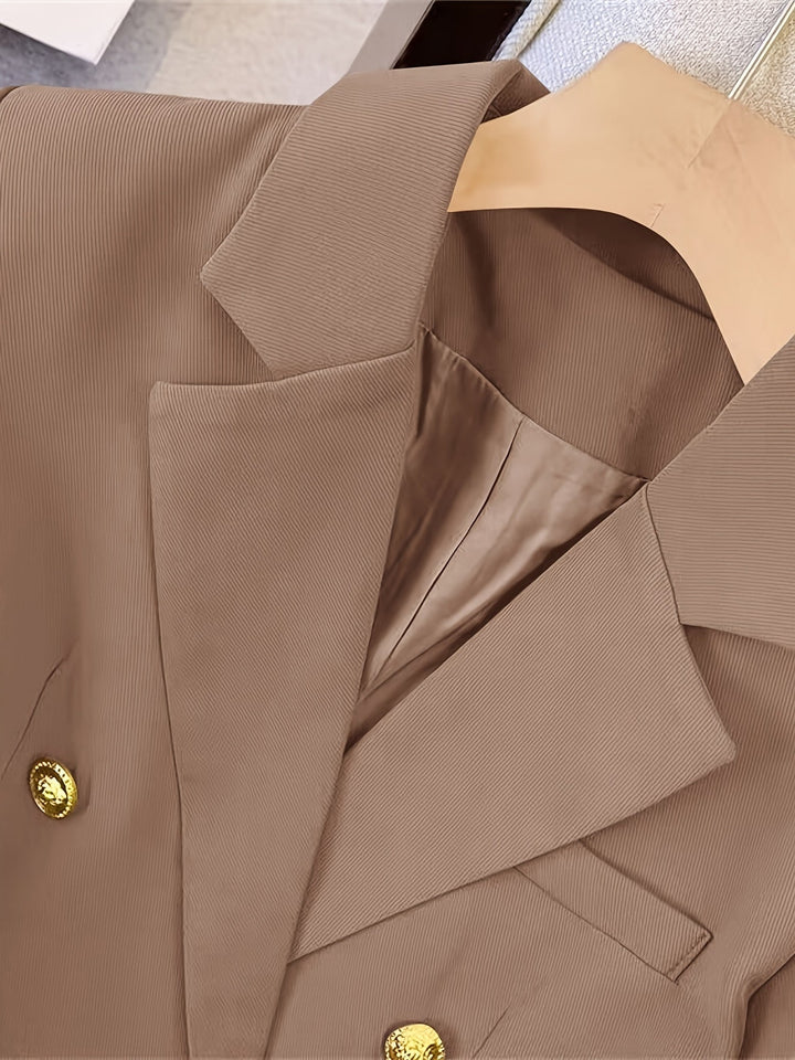 Elegant women's slim blazer with golden buttons, hip-length, long sleeves, in apricot, black, or camel, enhances style.