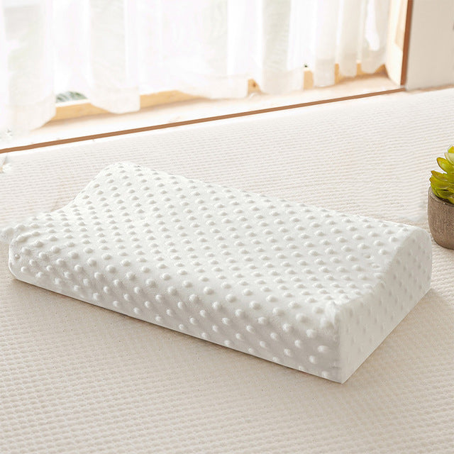 "Ergonomic memory foam pillow providing ultimate neck support with adaptive fit, breathable cover, and cooling technology."