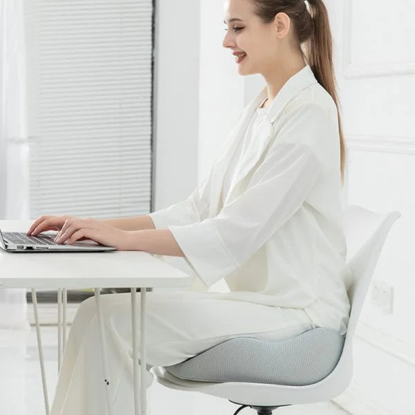 "Ergonomic men's memory foam seat cushion in grey, supports hips and back, perfect for office chairs and car seats."