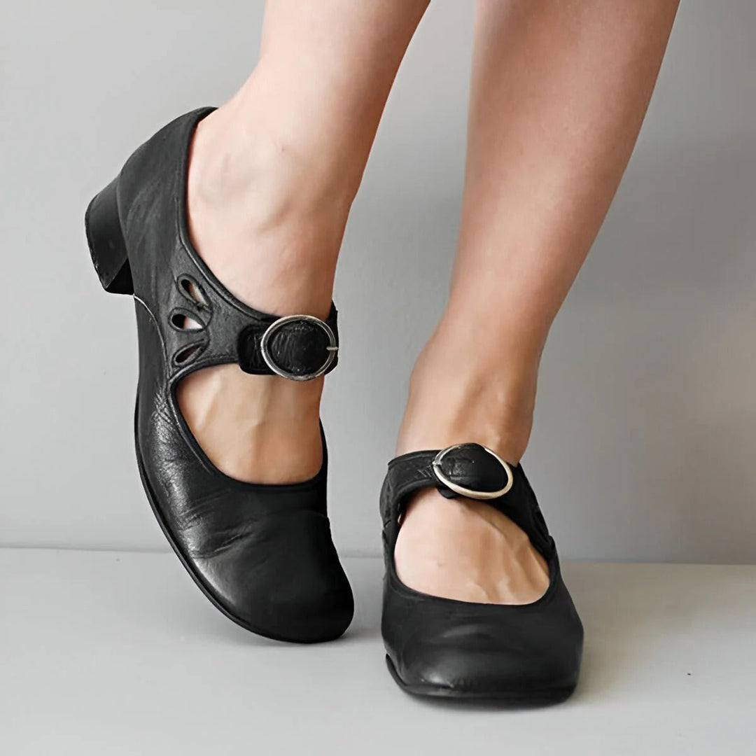 Ergonomic women's orthopedic leather sandals with adjustable straps, designed for comfort and natural foot alignment.