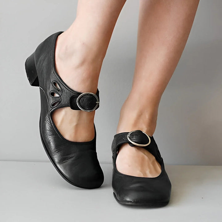 Ergonomic women's orthopedic leather sandals with adjustable straps, designed for comfort and natural foot alignment.