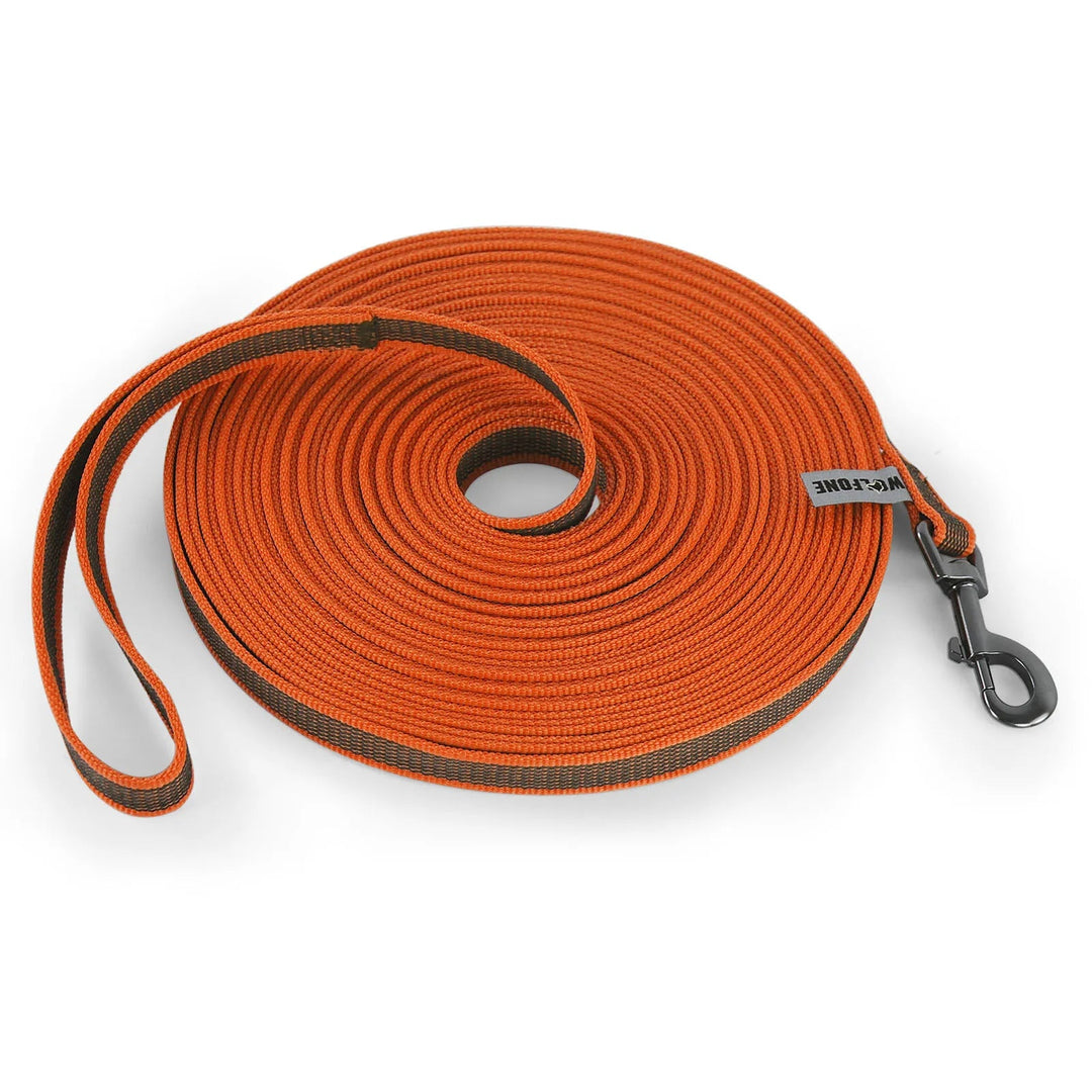 "Extra long waterproof dog lead with comfy handle, in orange, durable nylon for all weather, secure soft-touch grip."