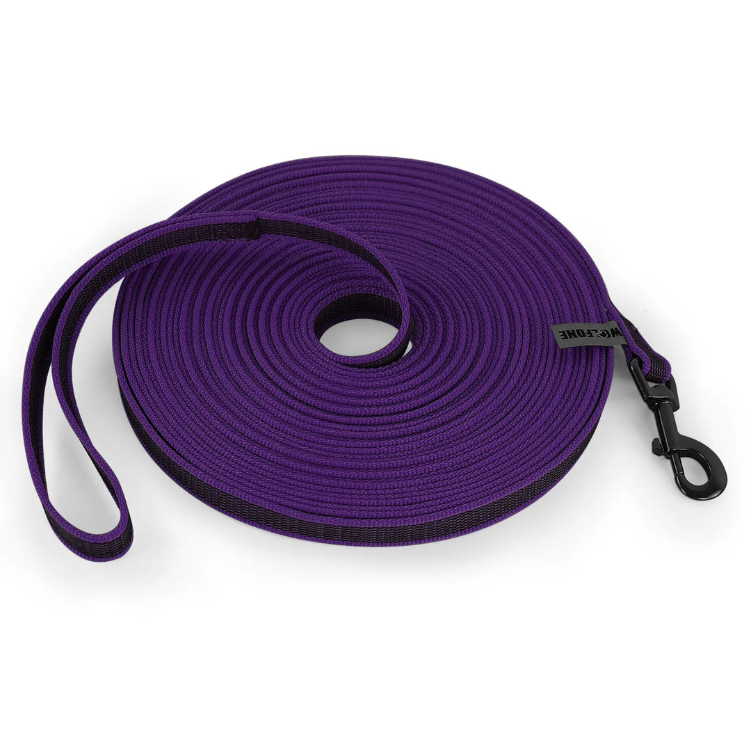 "Extra long waterproof dog lead with comfy handle, in orange, durable nylon for all weather, secure soft-touch grip."