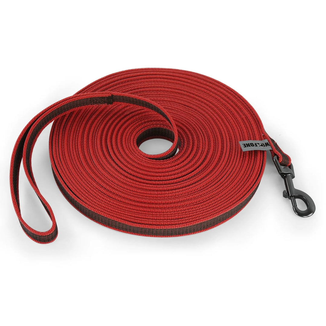 "Extra long waterproof dog lead with comfy handle, in orange, durable nylon for all weather, secure soft-touch grip."