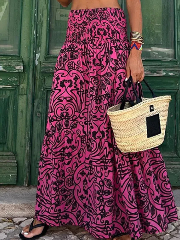 "Flowy women's boho floral print maxi skirt with vibrant colors, perfect for casual outings and summer style."