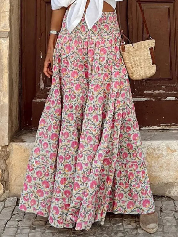 "Flowy women's boho floral print maxi skirt with vibrant colors, perfect for casual outings and summer style."