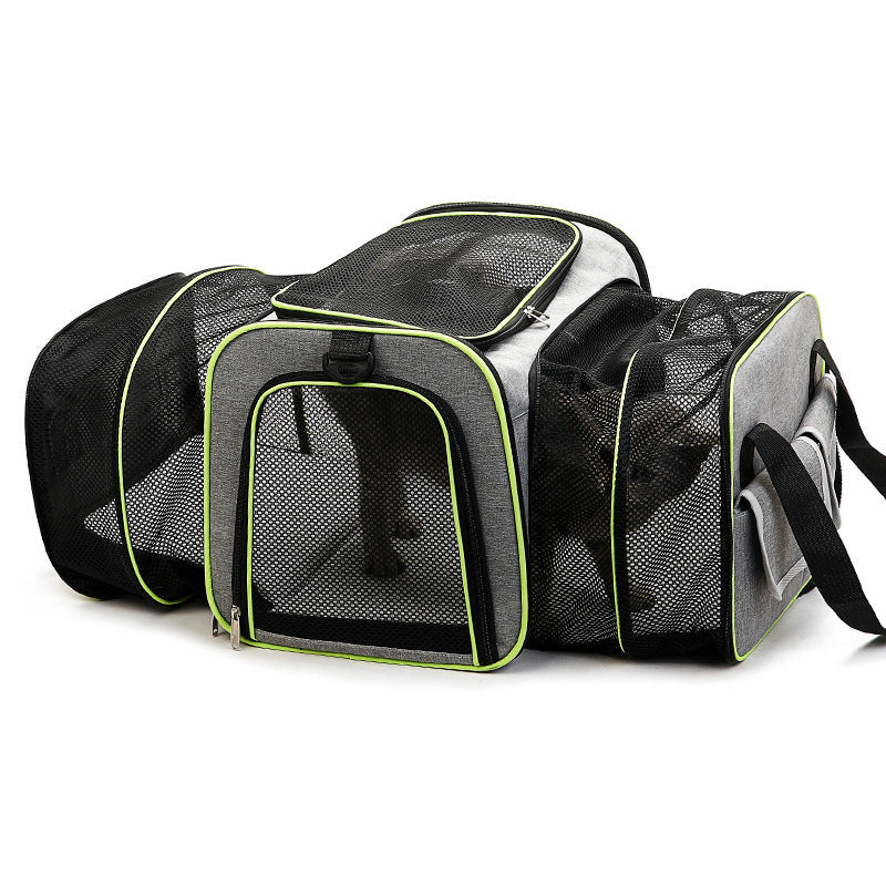 Foldable pet carrier bag with mesh inserts, soft materials, and secure zippers; ideal for comfortable and safe pet travel.