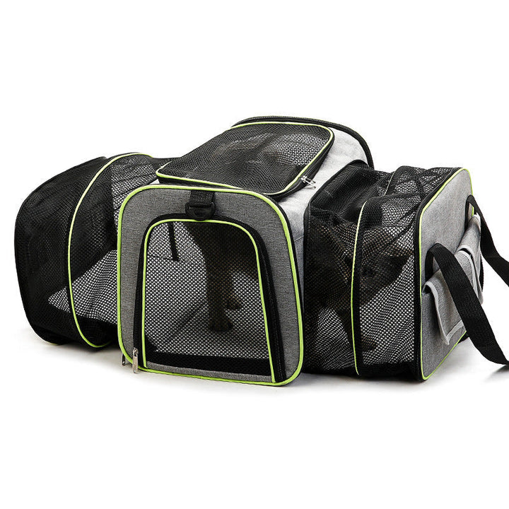 Foldable pet carrier bag with mesh inserts, soft materials, and secure zippers; ideal for comfortable and safe pet travel.