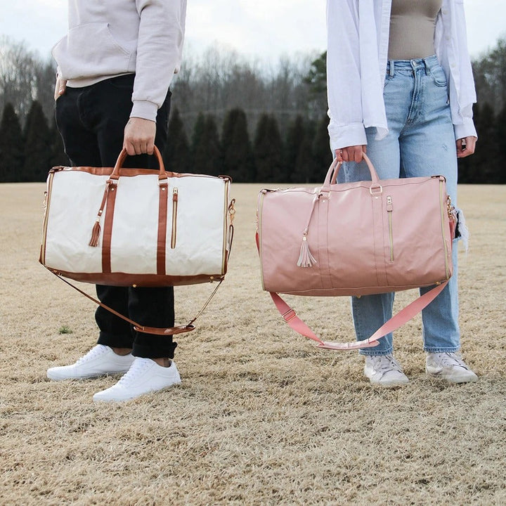 "Foldable smart carry-on bag with sleek design, multi-compartment storage, vegan leather, and garment cover for travel."