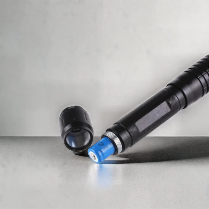 Front view of BlazeMaster Tactical Laser Torch, blue laser, sleek design, compact outdoor tool, technology & gadgets.