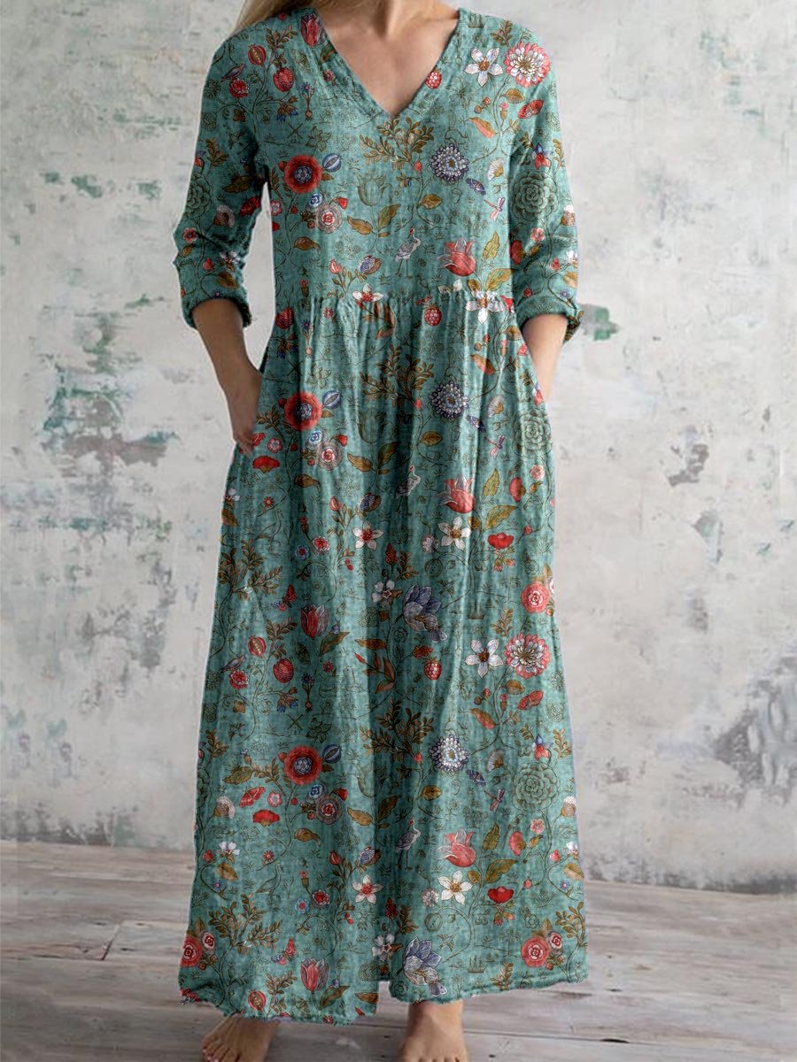 "Front view of floral V-neck empire waist summer dress with short sleeves, ideal for warm weather and elegant occasions."