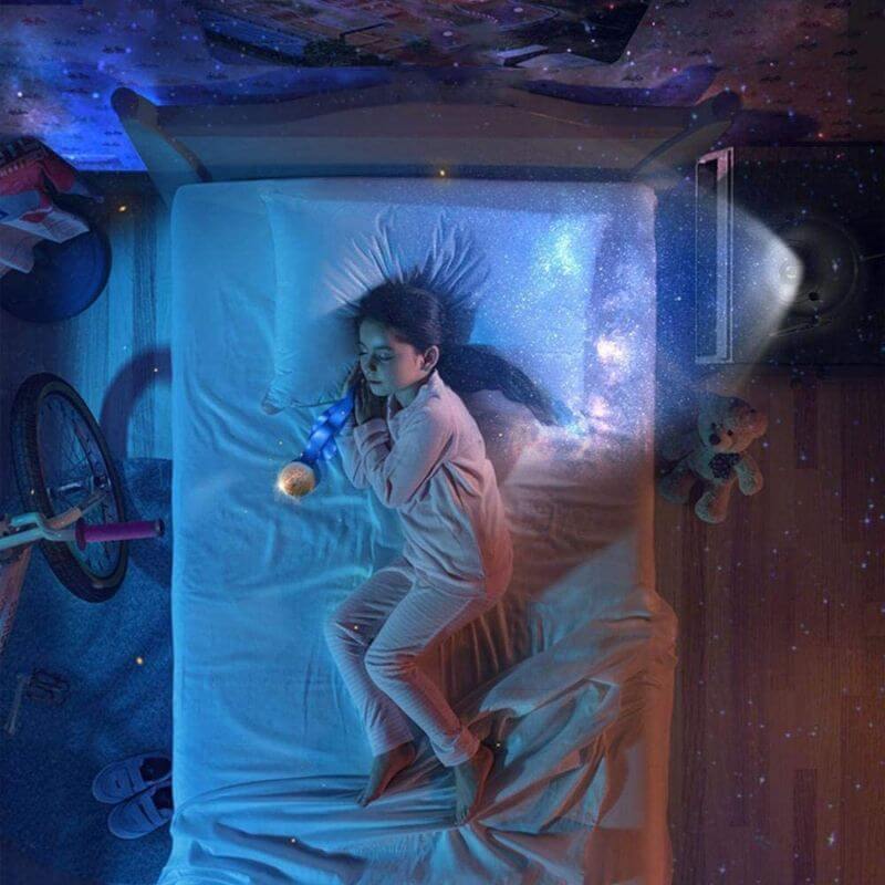 Galaxy projector displaying vivid night sky with 60,000 stars, compact design for home decor in kids and living rooms.