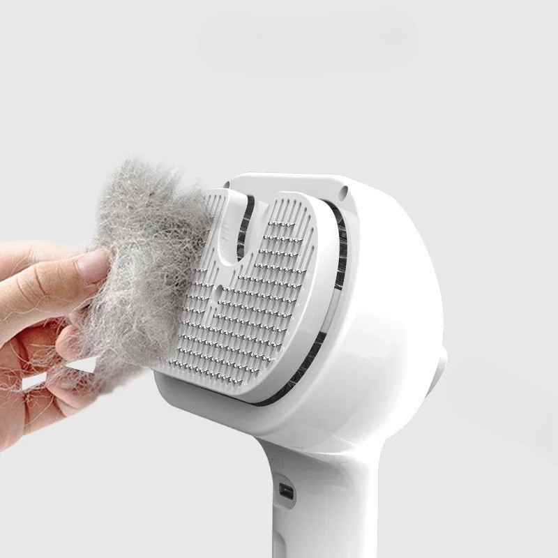 "Gentle grooming brush with spray for cats and dogs; soft round comb tips, anti-static, dampens coat, soothing on fur."