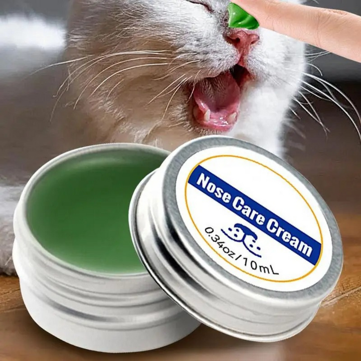 "Gentle protection balm for dry dog noses, moisturizing cracked snouts, weather-resistant, quick absorption for comfort."