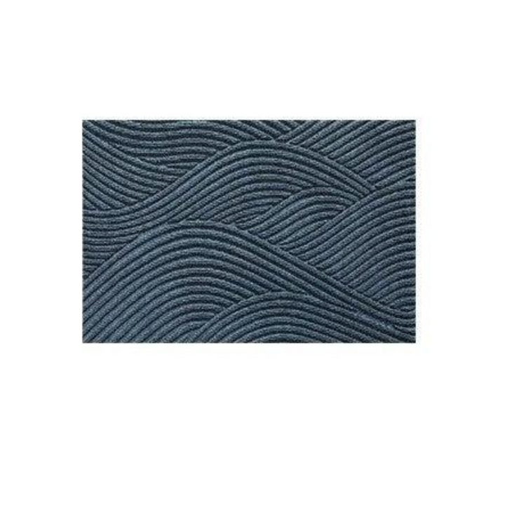 "Green non-slip heavy-duty door mat with textured surface for indoor/outdoor use, resists dirt, rain, and sun exposure."