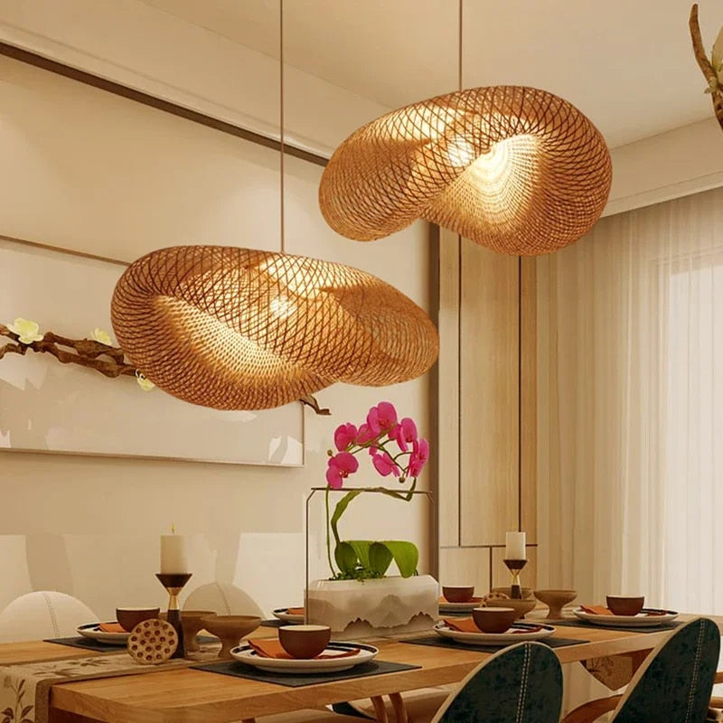 "Handcrafted bamboo pendant light with wave-pattern wicker rattan shade, adds warm, natural elegance to any interior space."