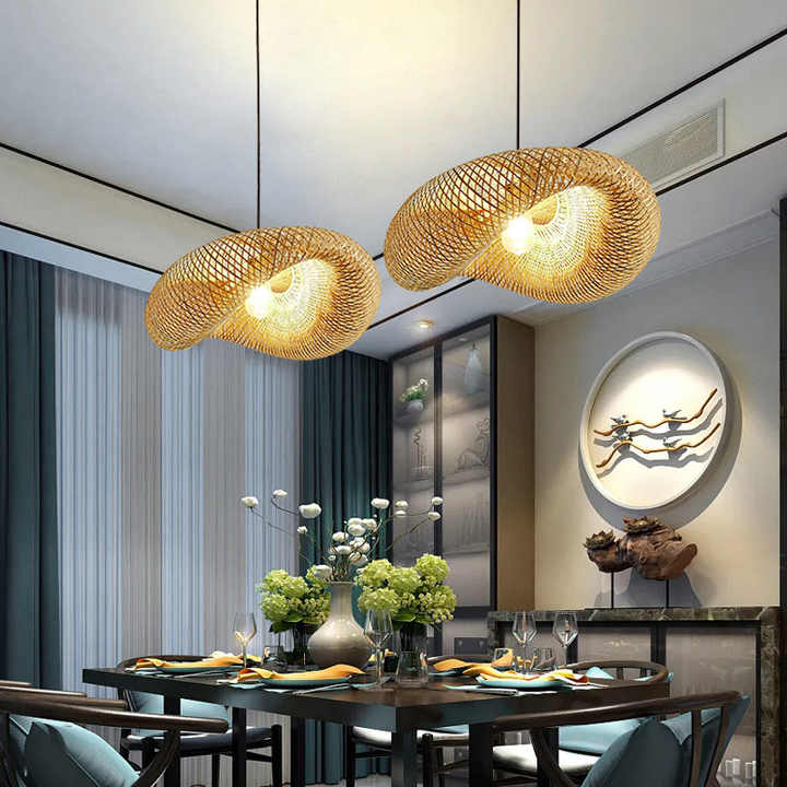 "Handcrafted bamboo pendant light with wave-pattern wicker rattan shade, adds warm, natural elegance to any interior space."