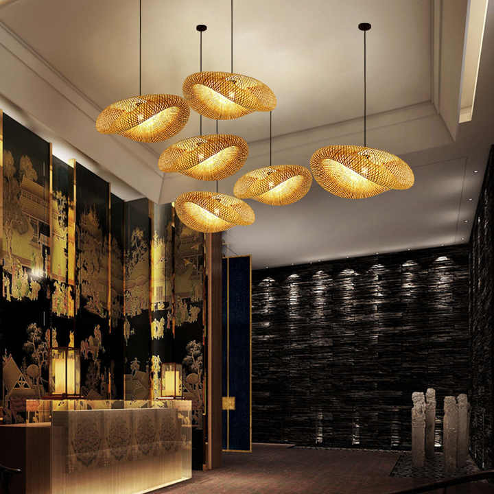 "Handcrafted bamboo pendant light with wave-pattern wicker rattan shade, adds warm, natural elegance to any interior space."