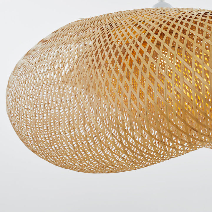 "Handcrafted bamboo pendant light with wave-pattern wicker rattan shade, adds warm, natural elegance to any interior space."
