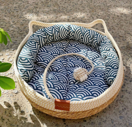 "Handcrafted sisal and cotton cat bed, white and blue tones, cozy cushion, nest design for comfort and scratching."