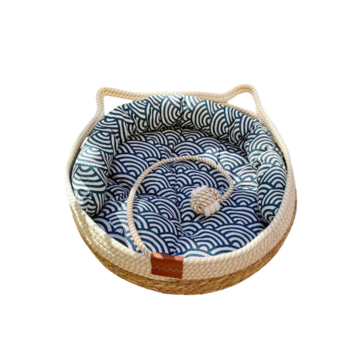 "Handcrafted sisal and cotton cat bed, white and blue tones, cozy cushion, nest design for comfort and scratching."