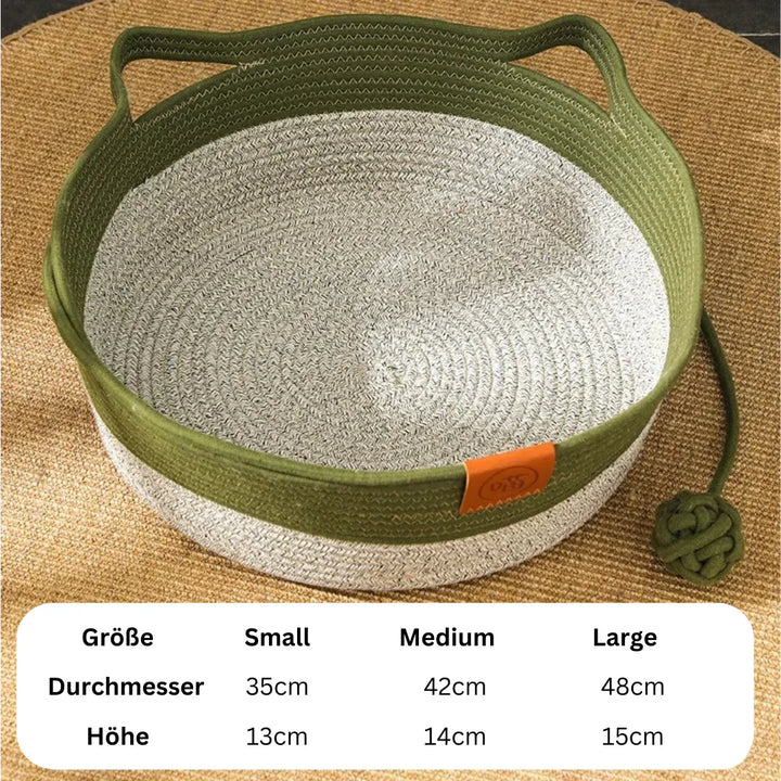 "Handwoven cotton rope cat bed with high sides in neutral tones, offering ultimate comfort and security for cats."