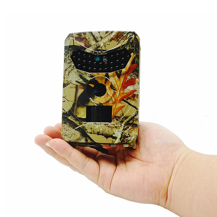 "HD wildlife trail camera with motion detection, captures day/night images; rugged design, compact for outdoor use."