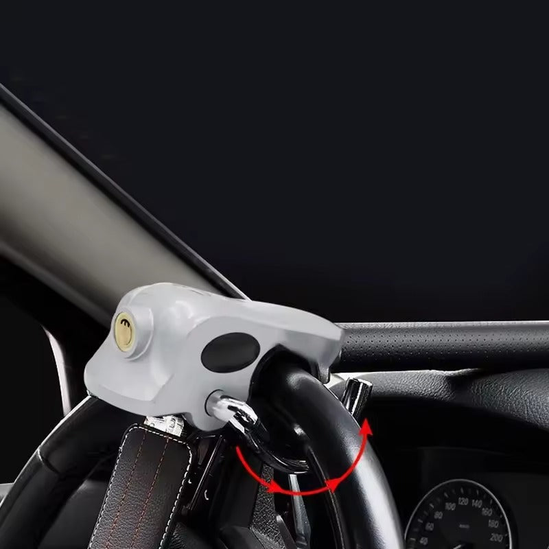 "High-visibility silver-black steering wheel lock with universal fit, durable steel-aluminum build, protects from theft."