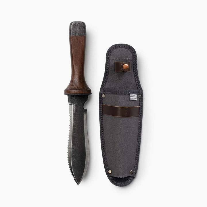 "Hori Hori garden knife with walnut handle and rust-resistant steel blade, perfect for outdoor tasks like digging and cutting