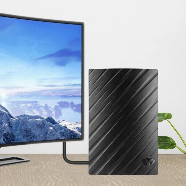 "Indoor 4K HDTV antenna, sleek black design, up to 600 miles range, with coaxial cable, fits modern living spaces."