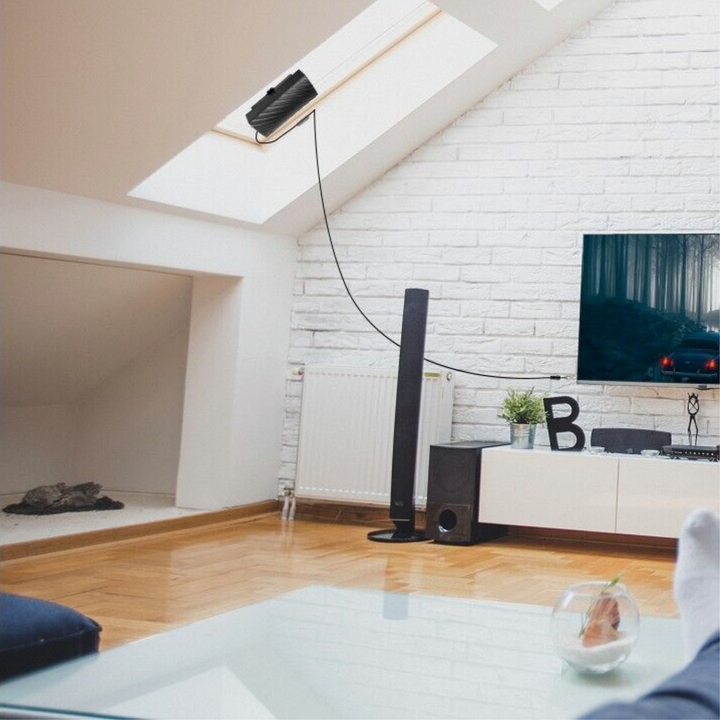"Indoor 4K HDTV antenna, sleek black design, up to 600 miles range, with coaxial cable, fits modern living spaces."