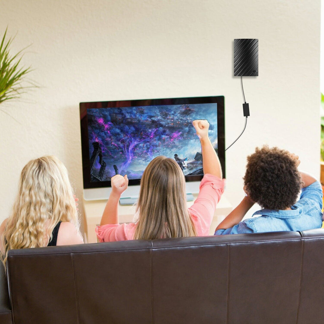 "Indoor 4K HDTV antenna, sleek black design, up to 600 miles range, with coaxial cable, fits modern living spaces."