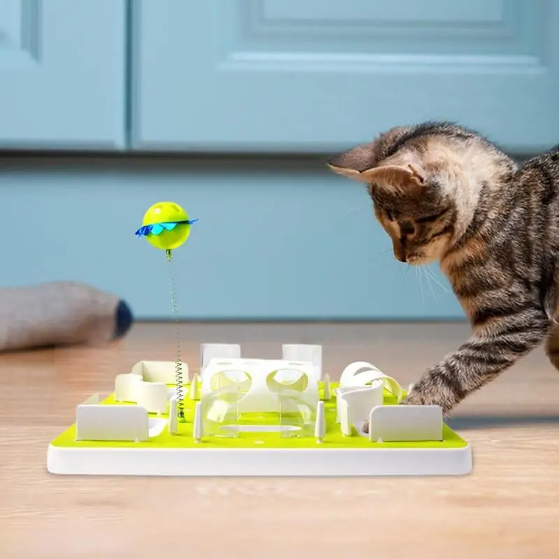 "Interactive cat puzzle feeder with adjustable challenge, featuring colorful maze pieces for engaging and stimulating playtim
