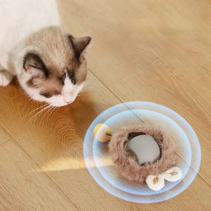 "Interactive cat toy, rolling ball with plush tail, vibrant color options for engaging feline play and exercise."
